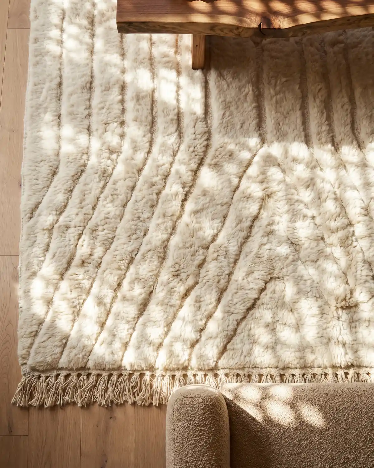 Opale white textured Moroccan rug – overhead detail of geometric relief pattern and fringe on oak floor