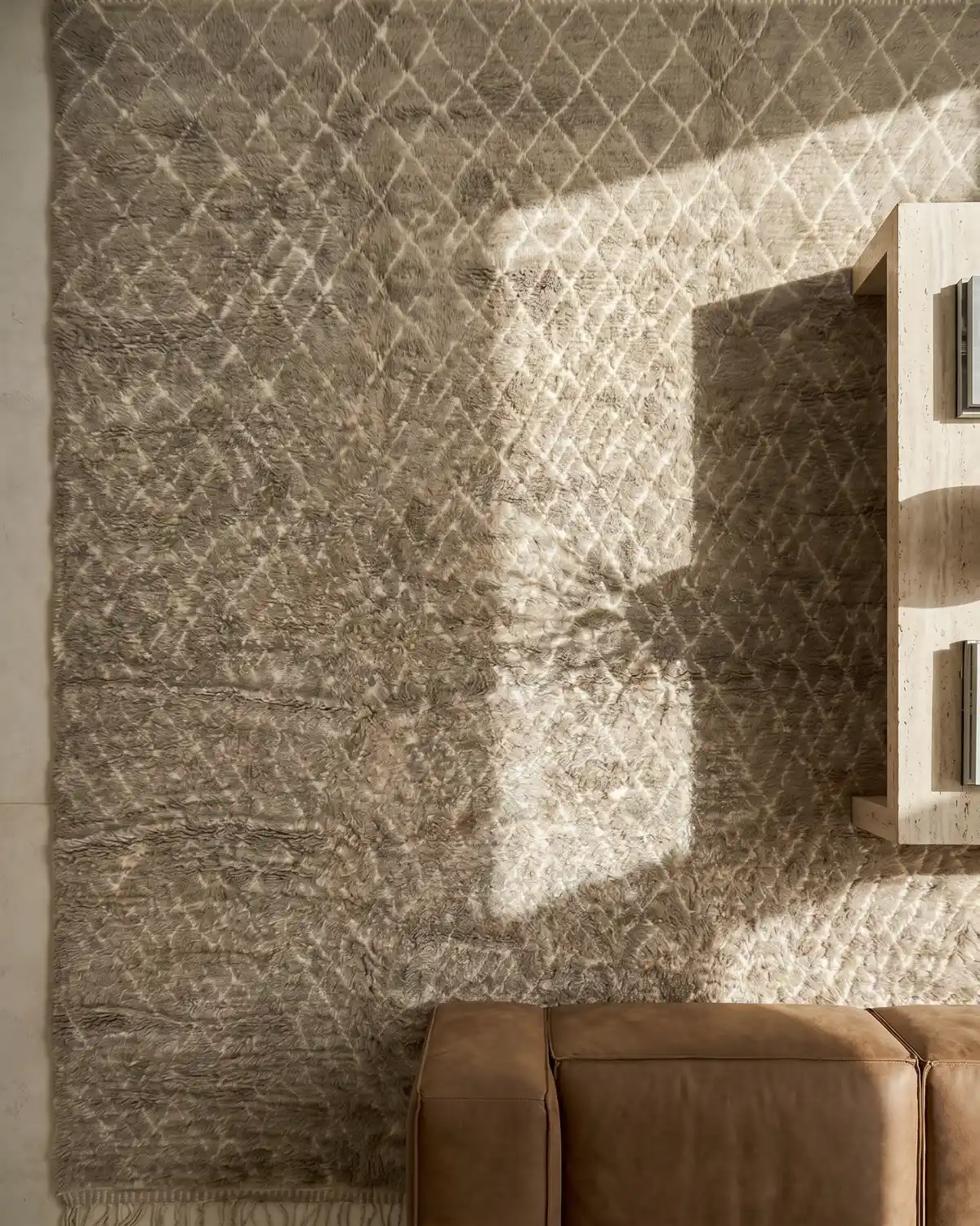 Deserelle Beni Ourain rug 300x400 – overhead view of sandy diamond pattern with natural light casting soft shadows across the wool surface