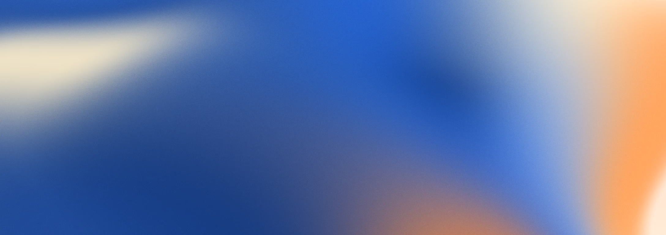 Abstract blurred background with blue and orange gradient colors.