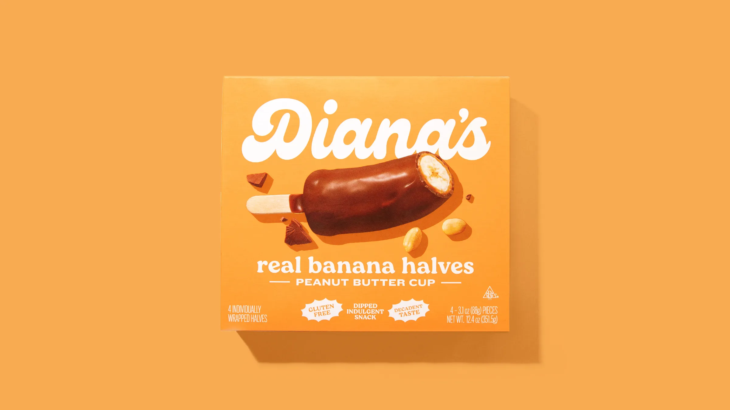 Orange Diana's Peanut Butter Cup real banana halves box with peanuts and chocolate chunks.