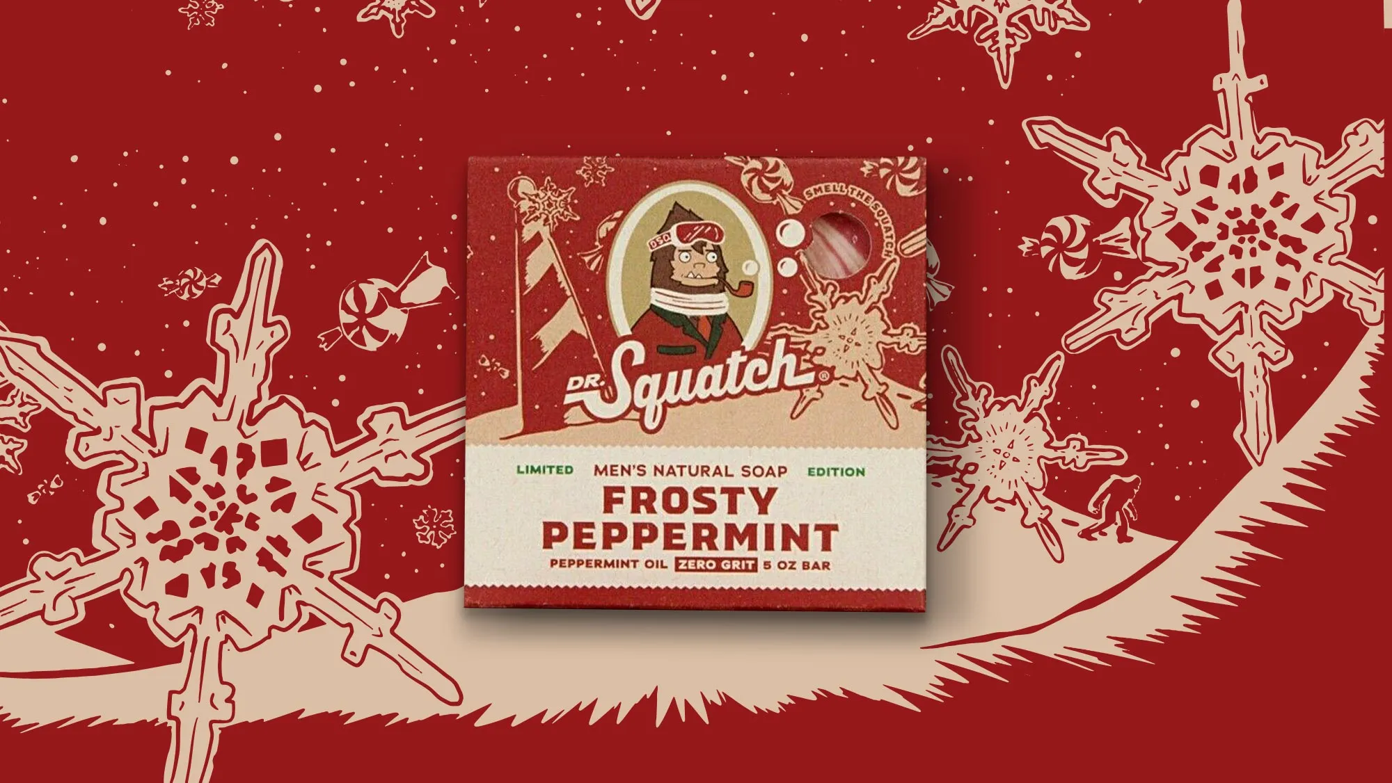 Limited-edition Frosty Peppermint soap box with Peppermint Oil over a red snowflake and candy-cane background.