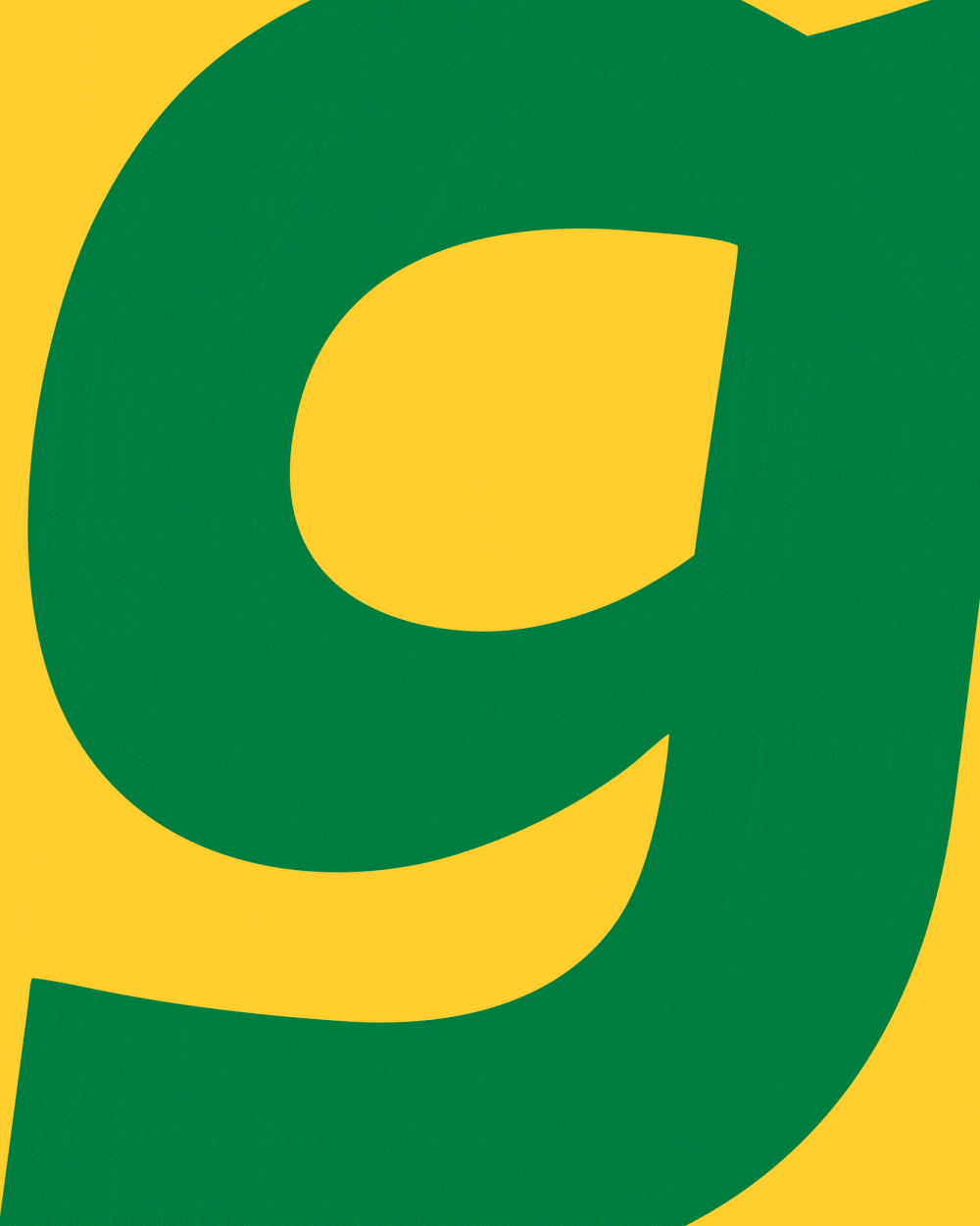Extreme close-up of a large green lowercase Grüns 'g' on a yellow background.