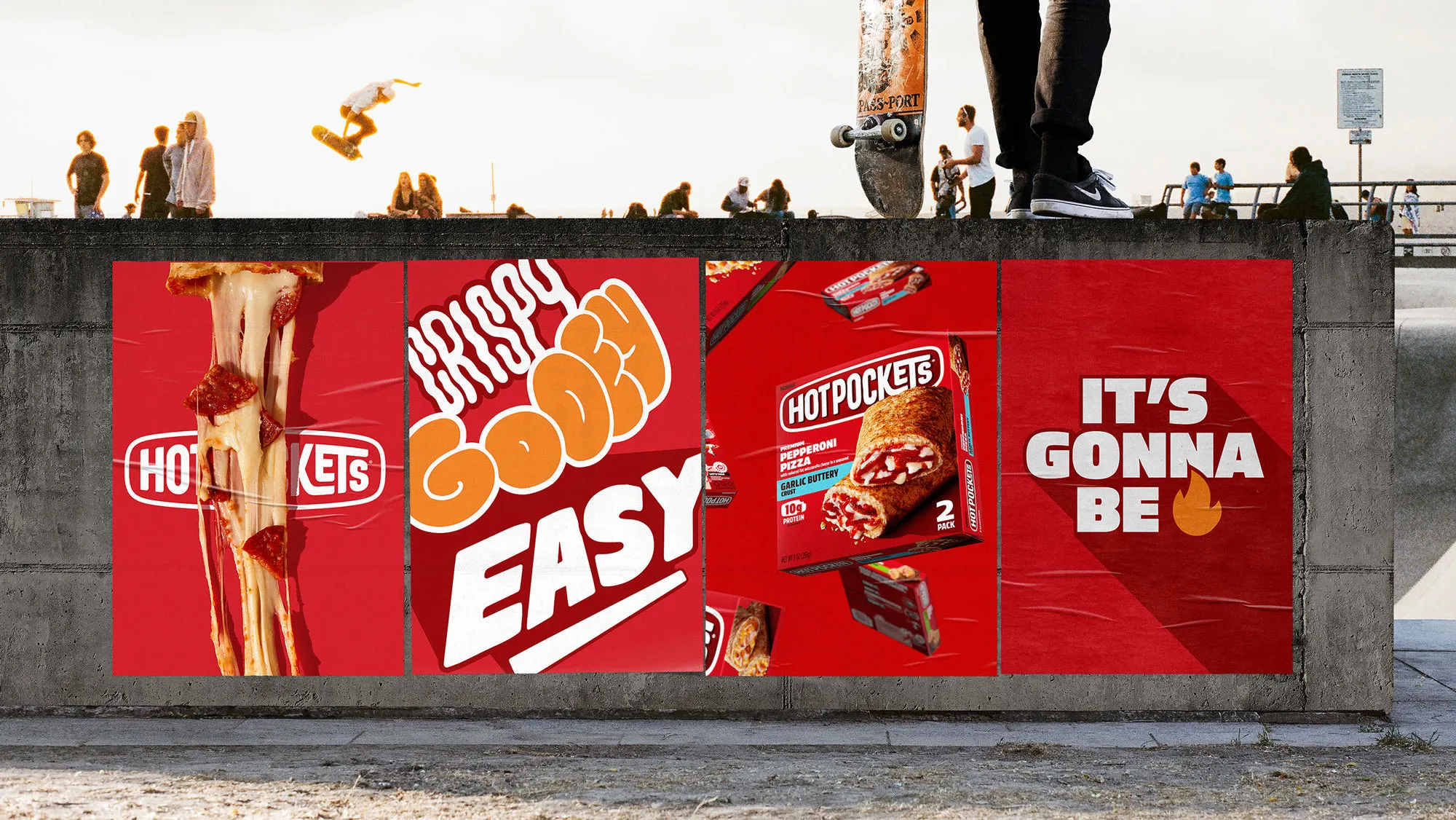 Wheatpaste poster wall at a skatepark with four red Hot Pockets posters including dripping cheese and 'Crispy gooey easy'.