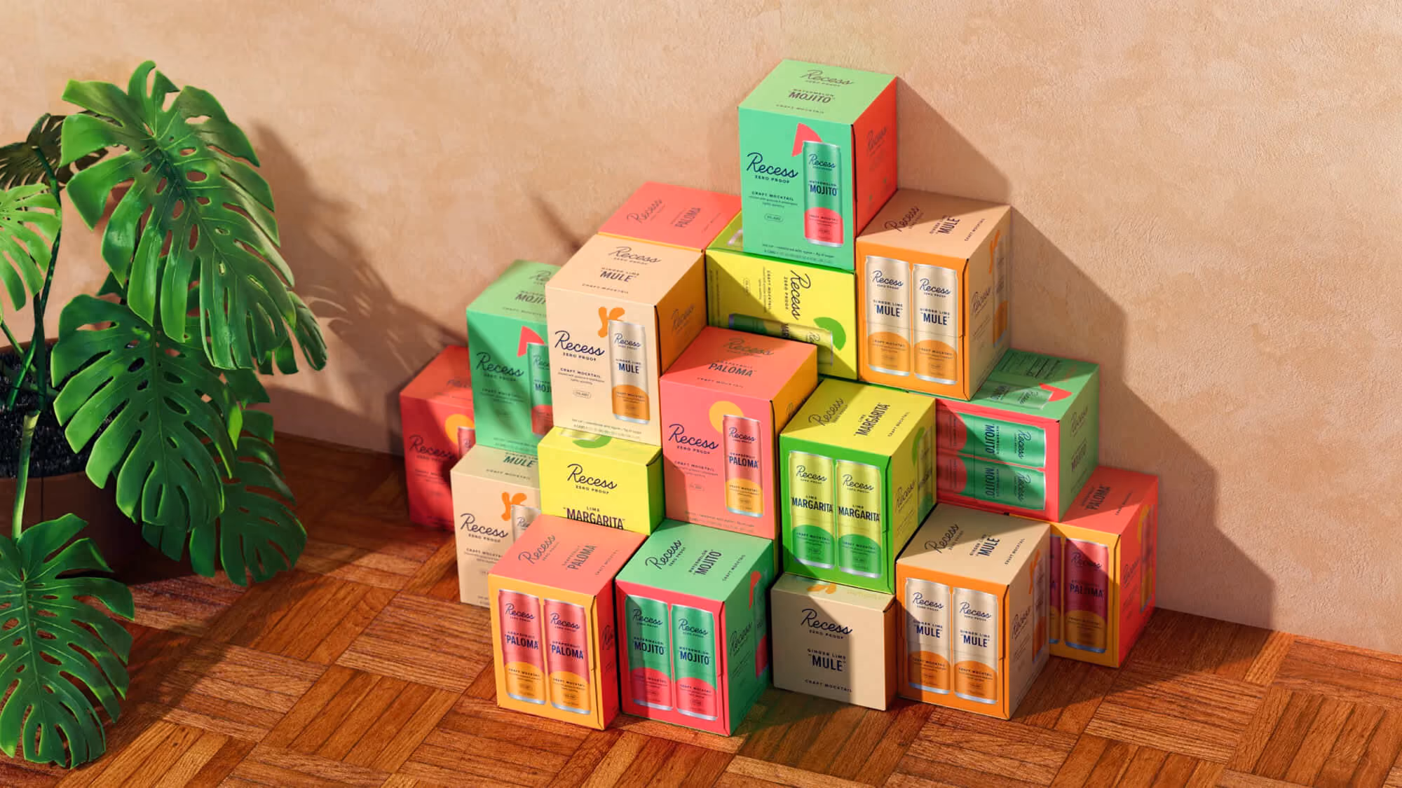 Stacked Recess Zero Proof multipack boxes — Mojito, Mule, Paloma, Margarita — in a warm room with a monstera plant and parquet floor.