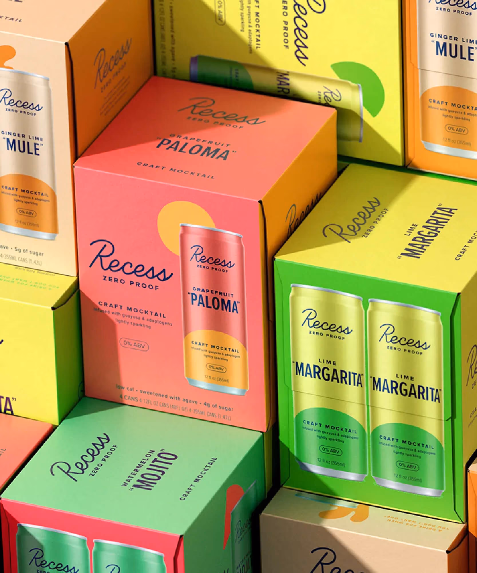 Close-up stack of Recess Zero Proof Paloma and Mule multipack cartons with cans visible through the packaging windows.