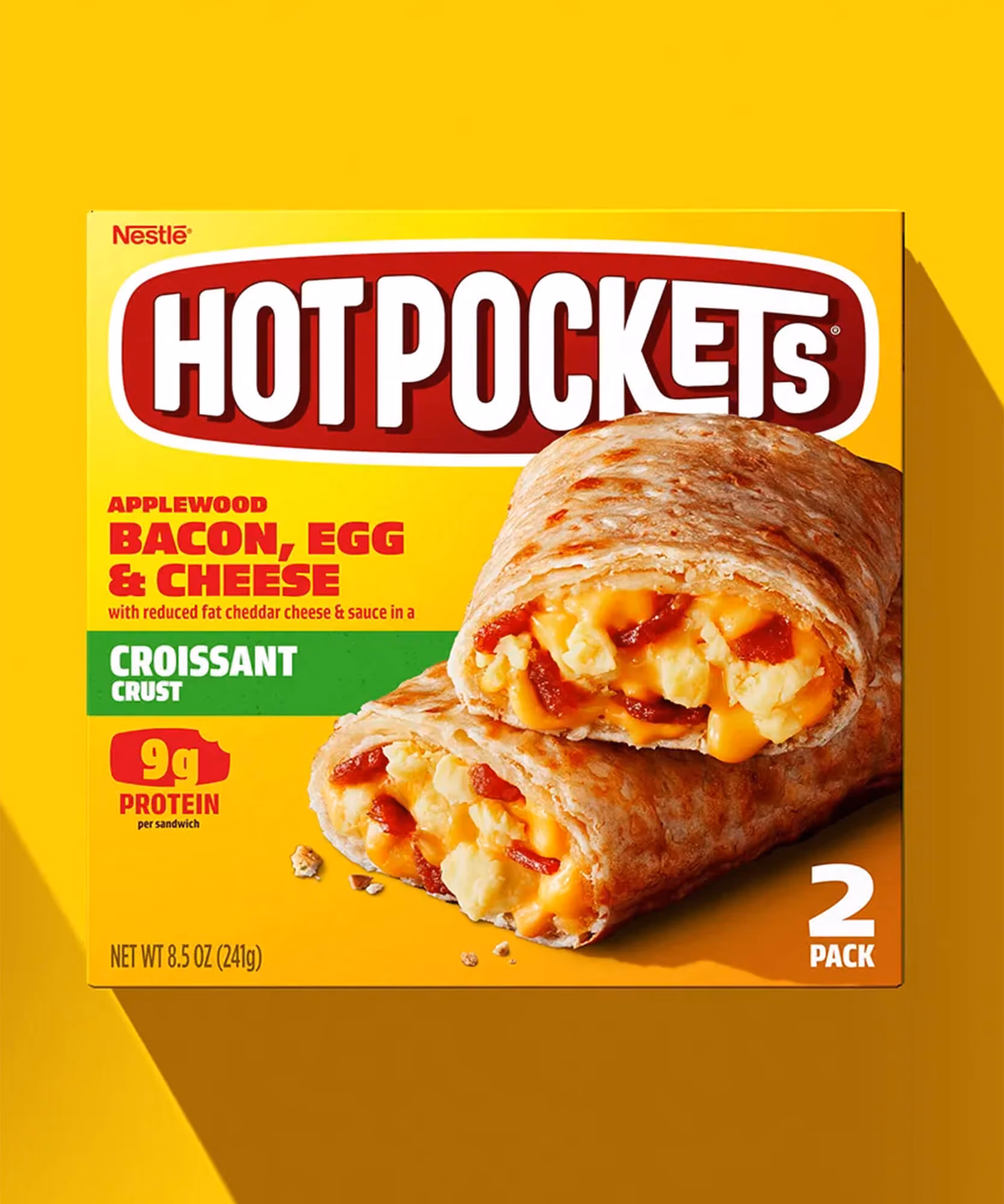 Vertical lineup of three Hot Pockets boxes: Pepperoni Pizza, Bacon Egg & Cheese Croissant, Big & Bold Buffalo Style Chicken.
