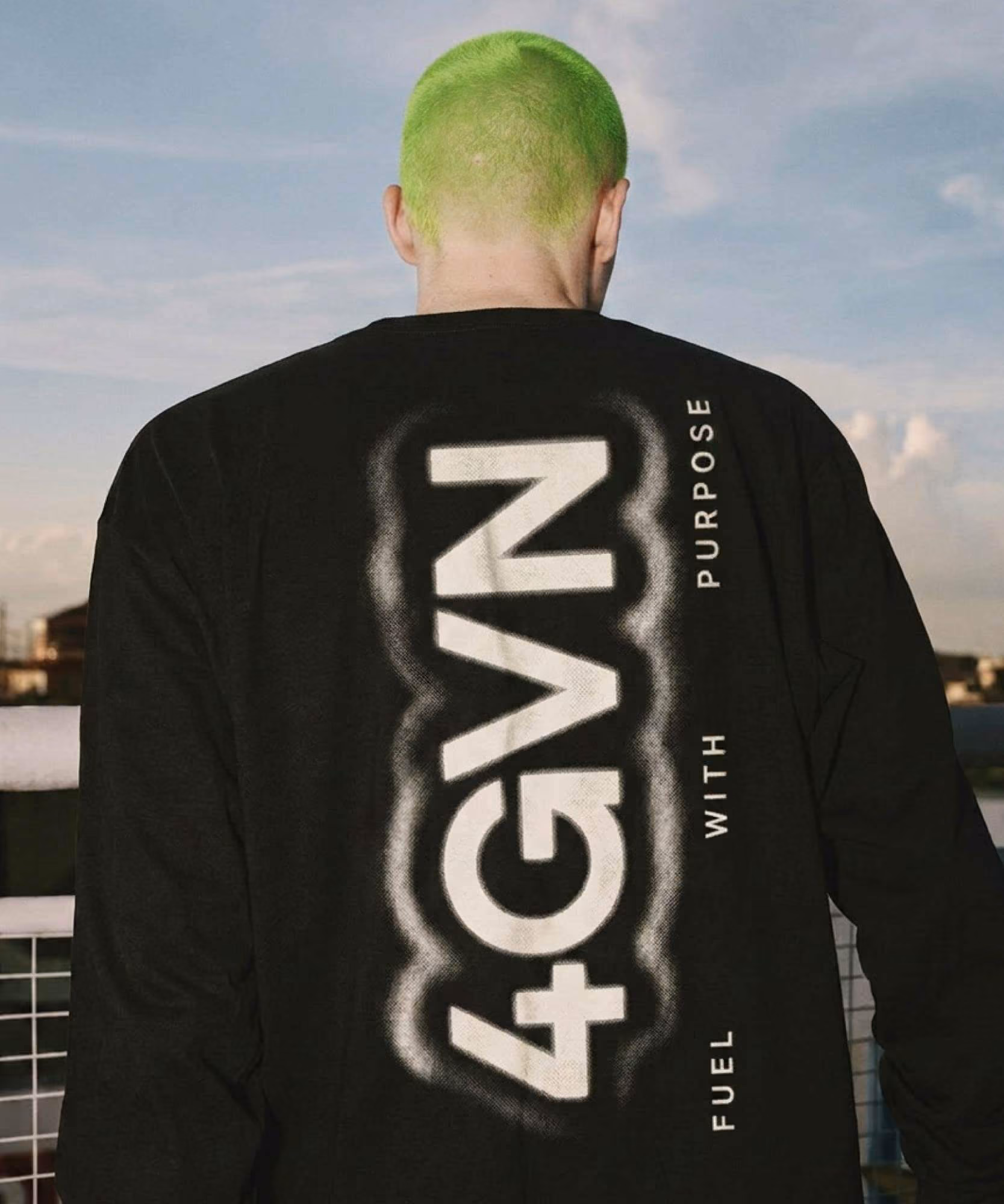 Black long-sleeve tee with spray-painted 4GVN back print and vertical "FUEL WITH PURPOSE"