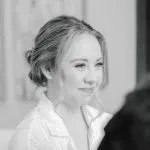 Bride with textured updo hairstyle on her wedding day, styled by Dayln Faith Hair and Beauty
