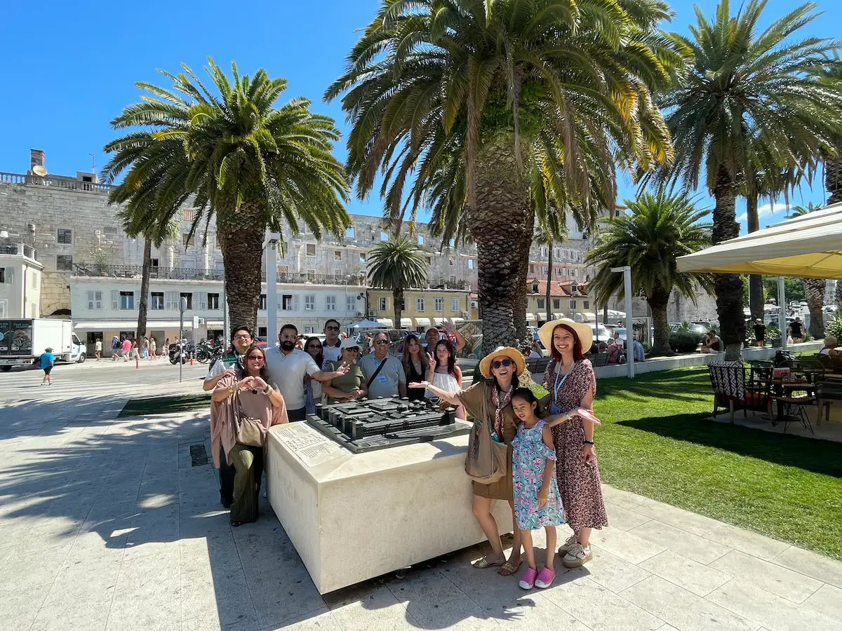 Time Walk private tour group at the bronze model of Diocletian's Palace on the Split Riva