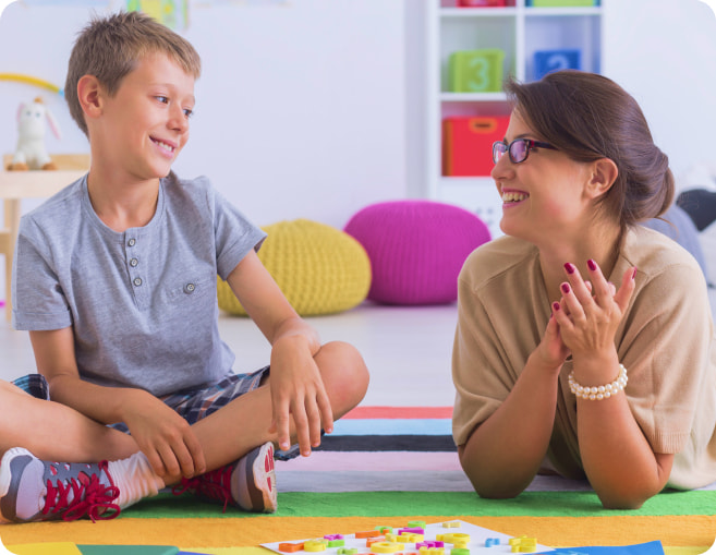 Therapist helping child