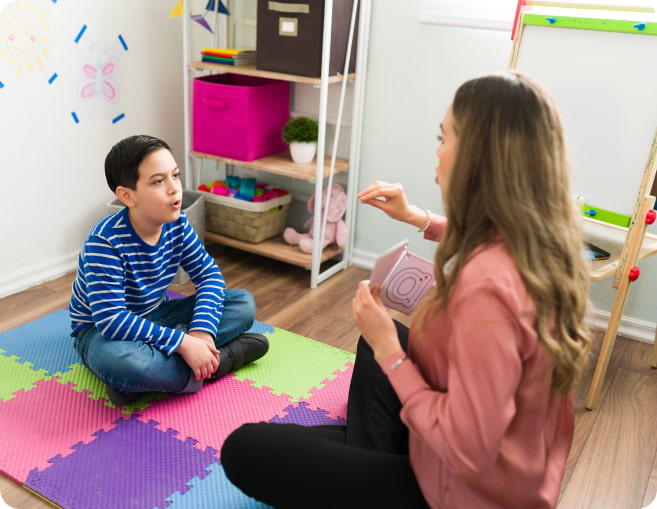 Therapist teaching child