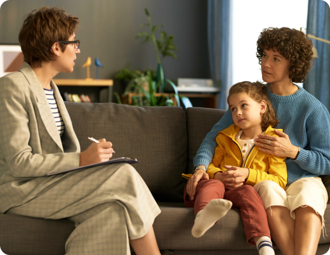 Therapist with parent and child