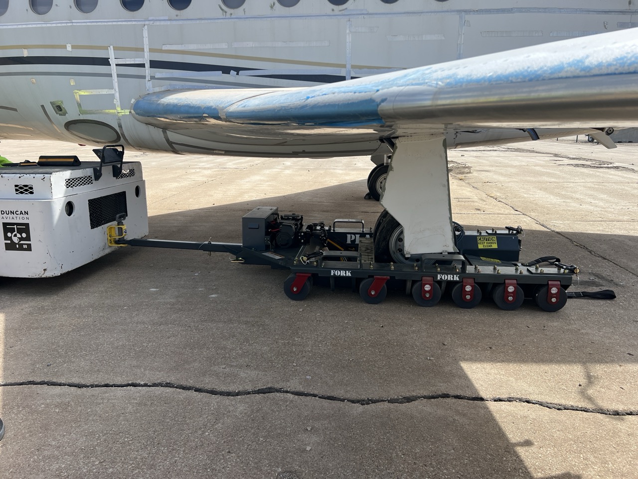 PLACEHOLDER — PlaneSkate in action. 17-minute runway clear. (Swap with real PlaneSkate-in-action photo.)