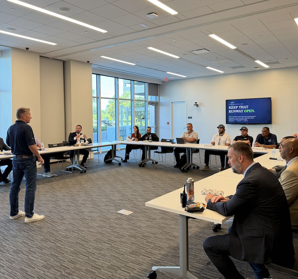 Mike Wiskus leading an aircraft recovery planning session with the airport operations team at Tampa International Airport
