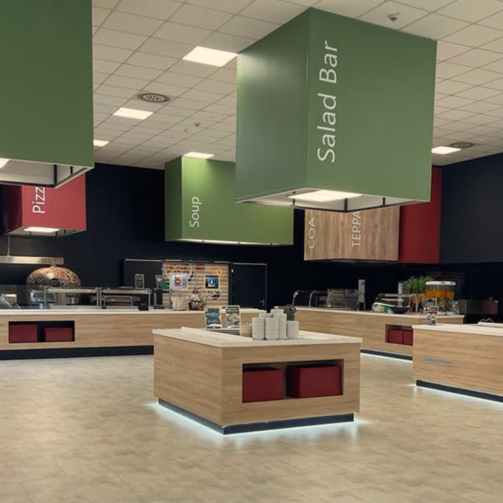 Staff serving lunch at a corporate canteen counter