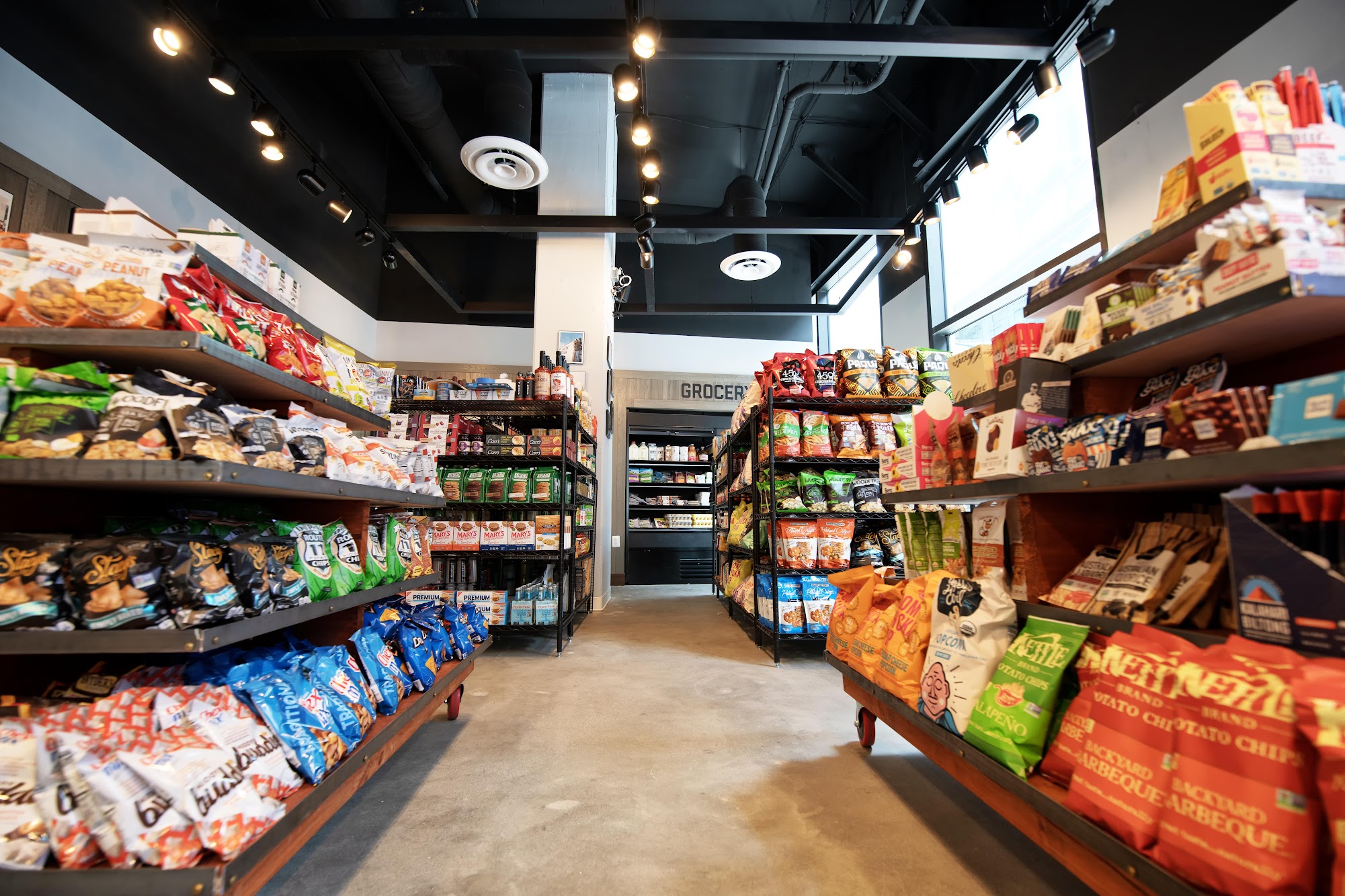 Union Kitchen store aisles stocked with chips and packaged snacks