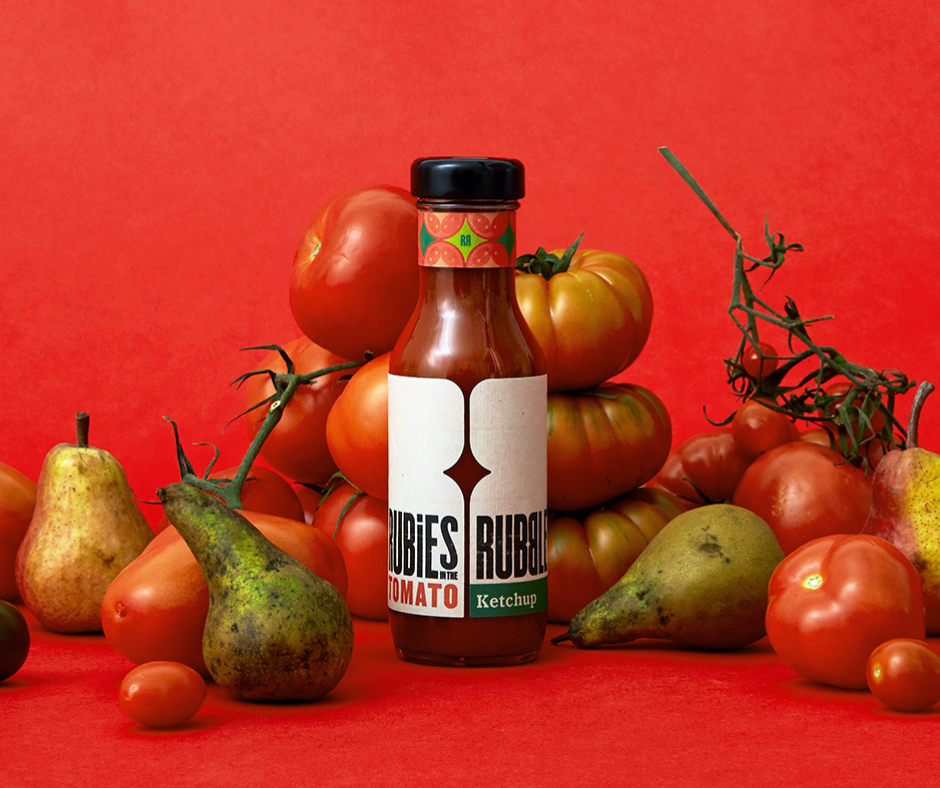 Rubies in the Rubble tomato ketchup bottle surrounded by tomatoes and pears