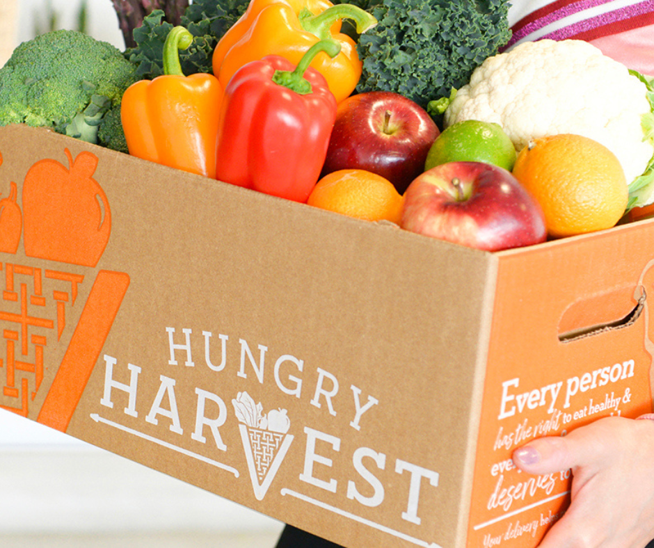 Hungry Harvest box of rescued peppers, apples, broccoli and cauliflower