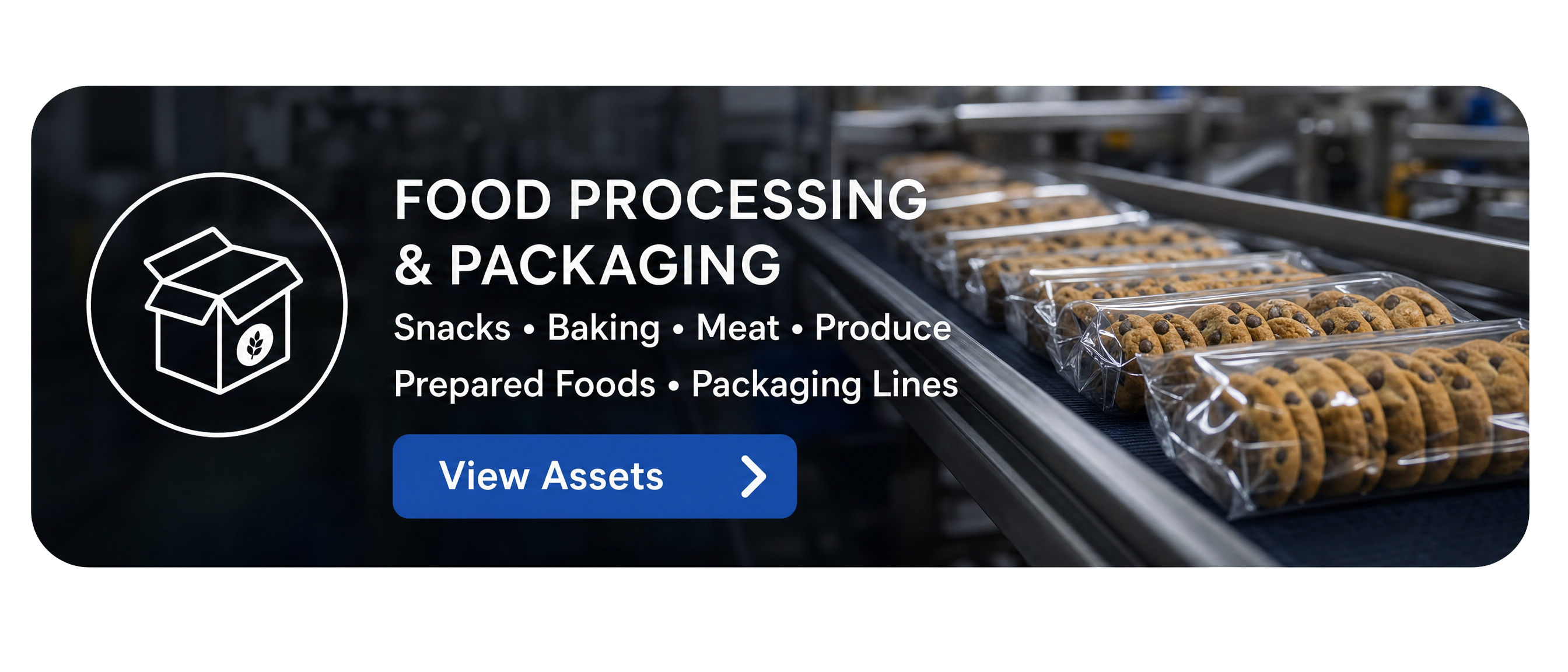 Chocolate chip cookies packaged in clear trays on a conveyor belt in a food processing plant.