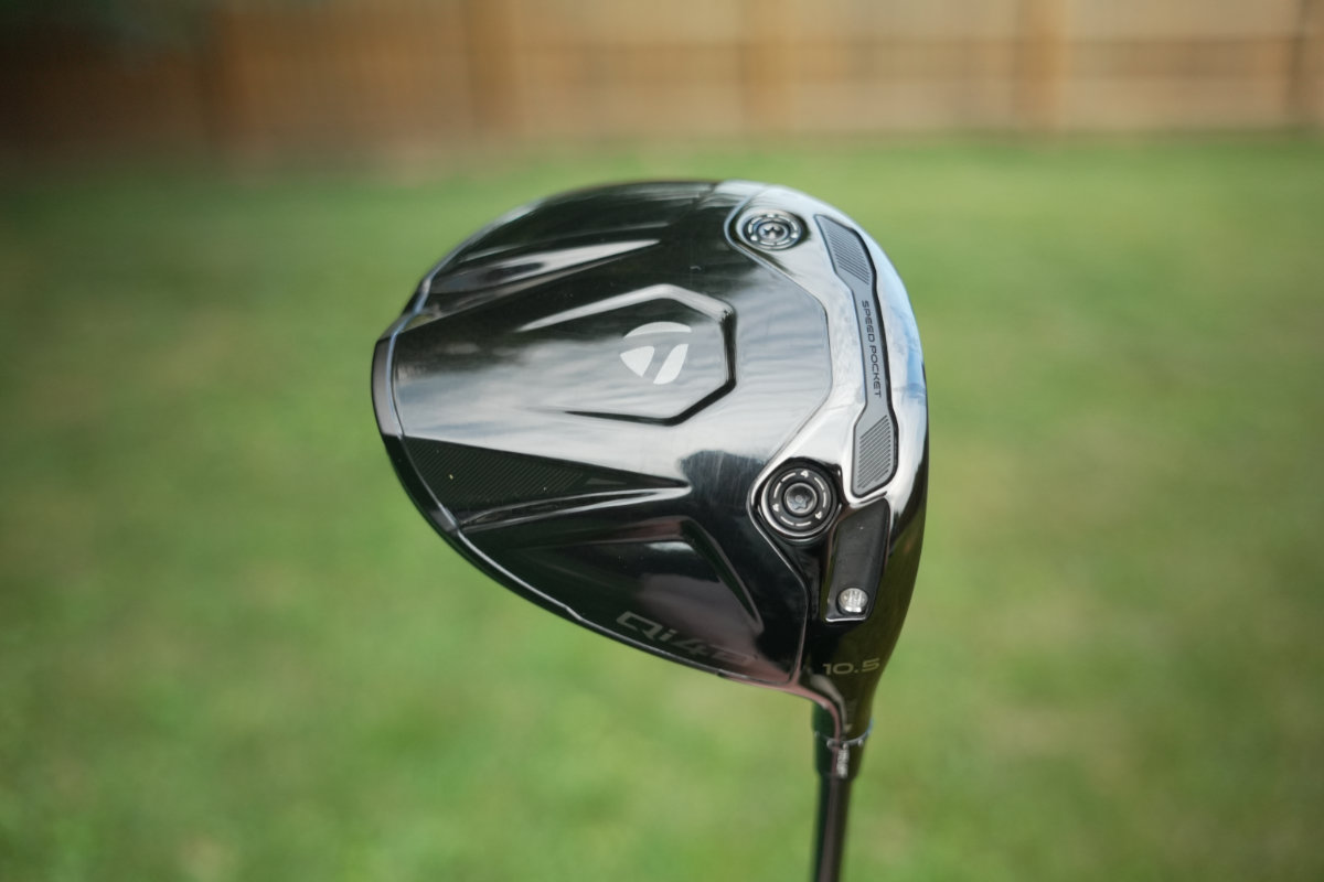 TaylorMade Qi4D Shadowfall Edition 10.5 degree driver face view on grass background