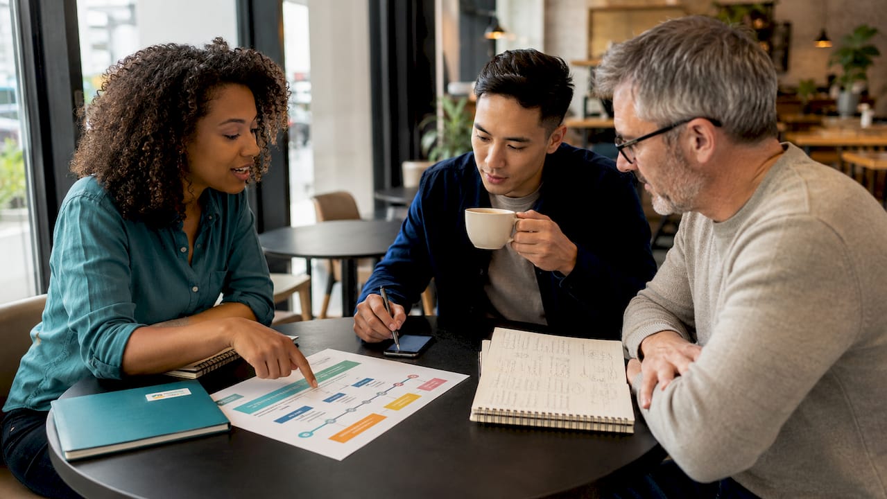Hands collaborating on SEO tool migration plan