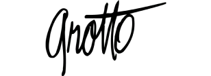 Signature-style black cursive handwriting on a white background. Grotto logo.
