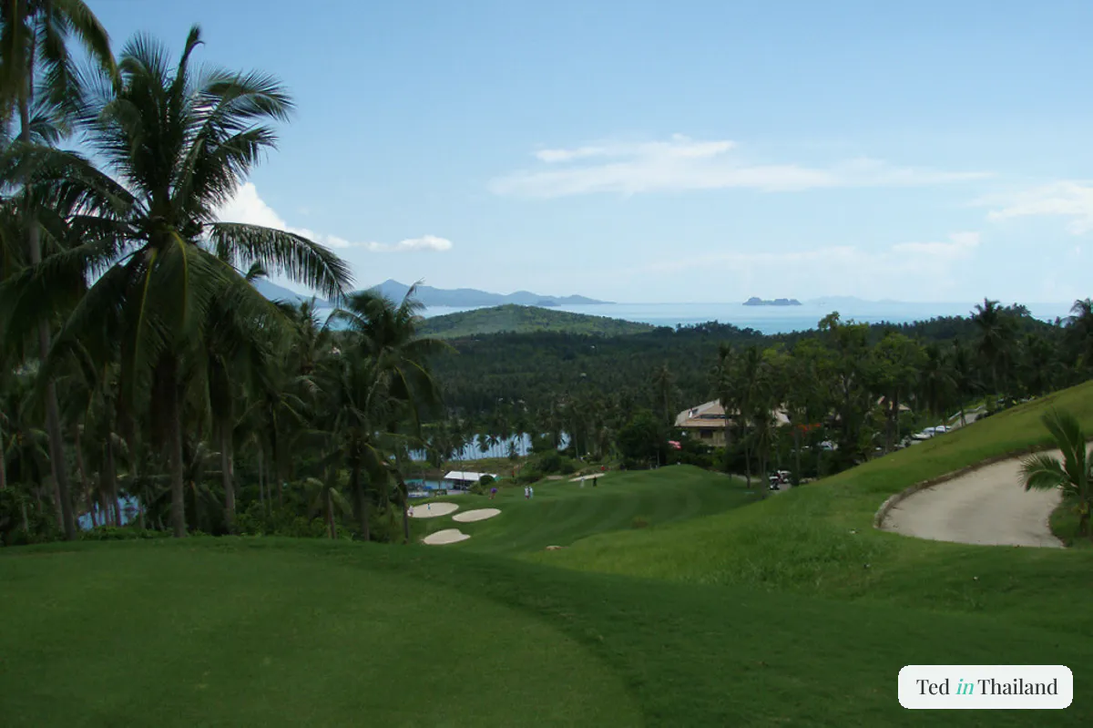Fairways of the Santiburi golf course on Koh Samui's hills with the north coast and offshore islets beyond