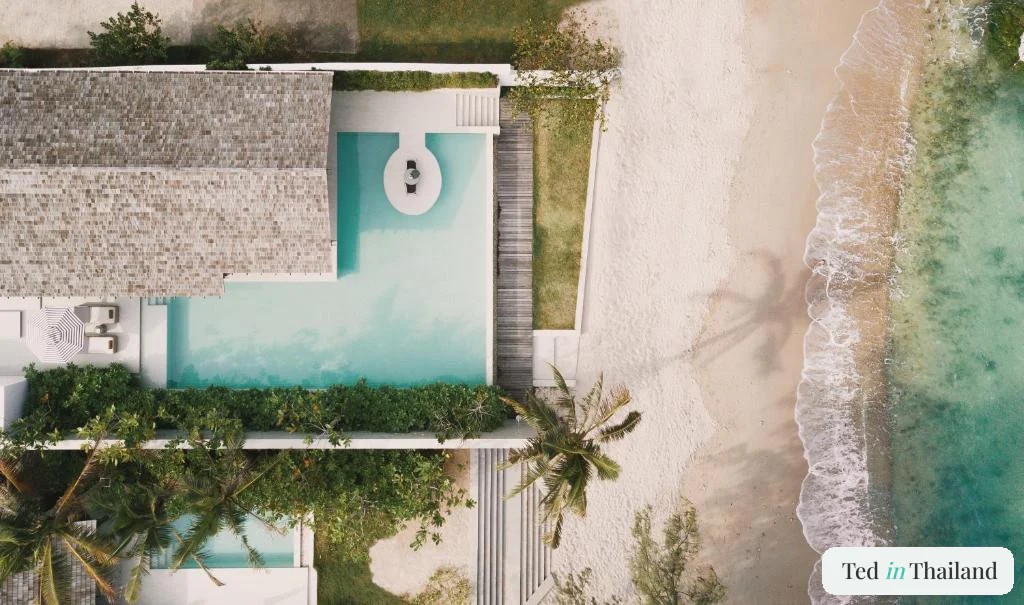 Overhead view of a beachfront pool villa at Kimpton Kitalay Samui on Choeng Mon Beach, a family luxury resort in Koh Samui