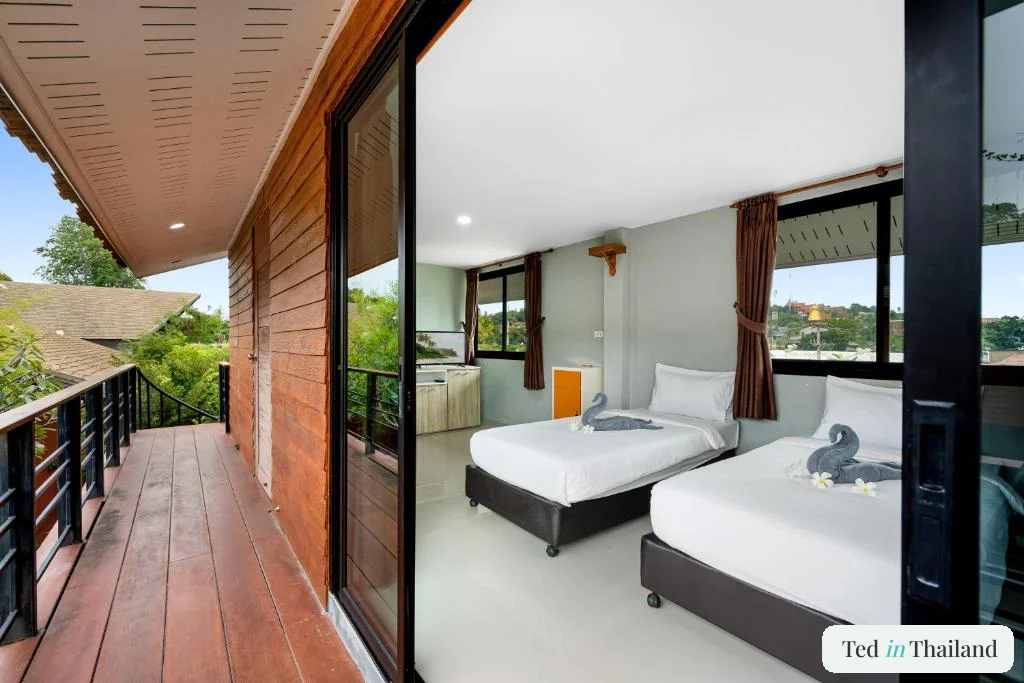 Simple twin room with balcony walkway at Chill Inn Samui hostel near Choeng Mon, a budget stay in Koh Samui