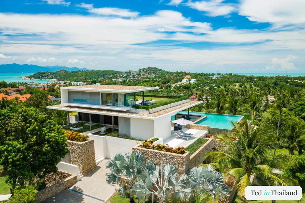Modern hillside villa with a cantilevered infinity pool at Samujana, a luxury private villa on Koh Samui
