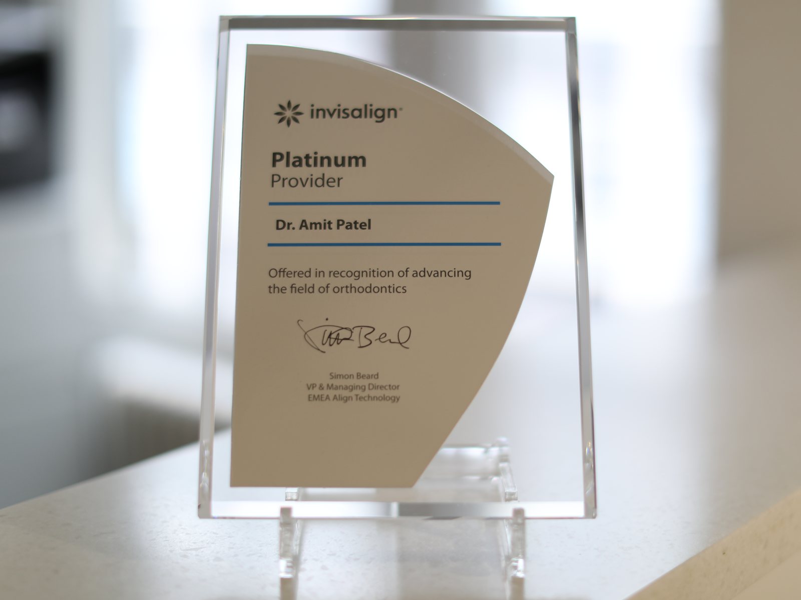 Invisalign® Platinum Provider plaque awarded to Dr Amit Patel by Align Technology