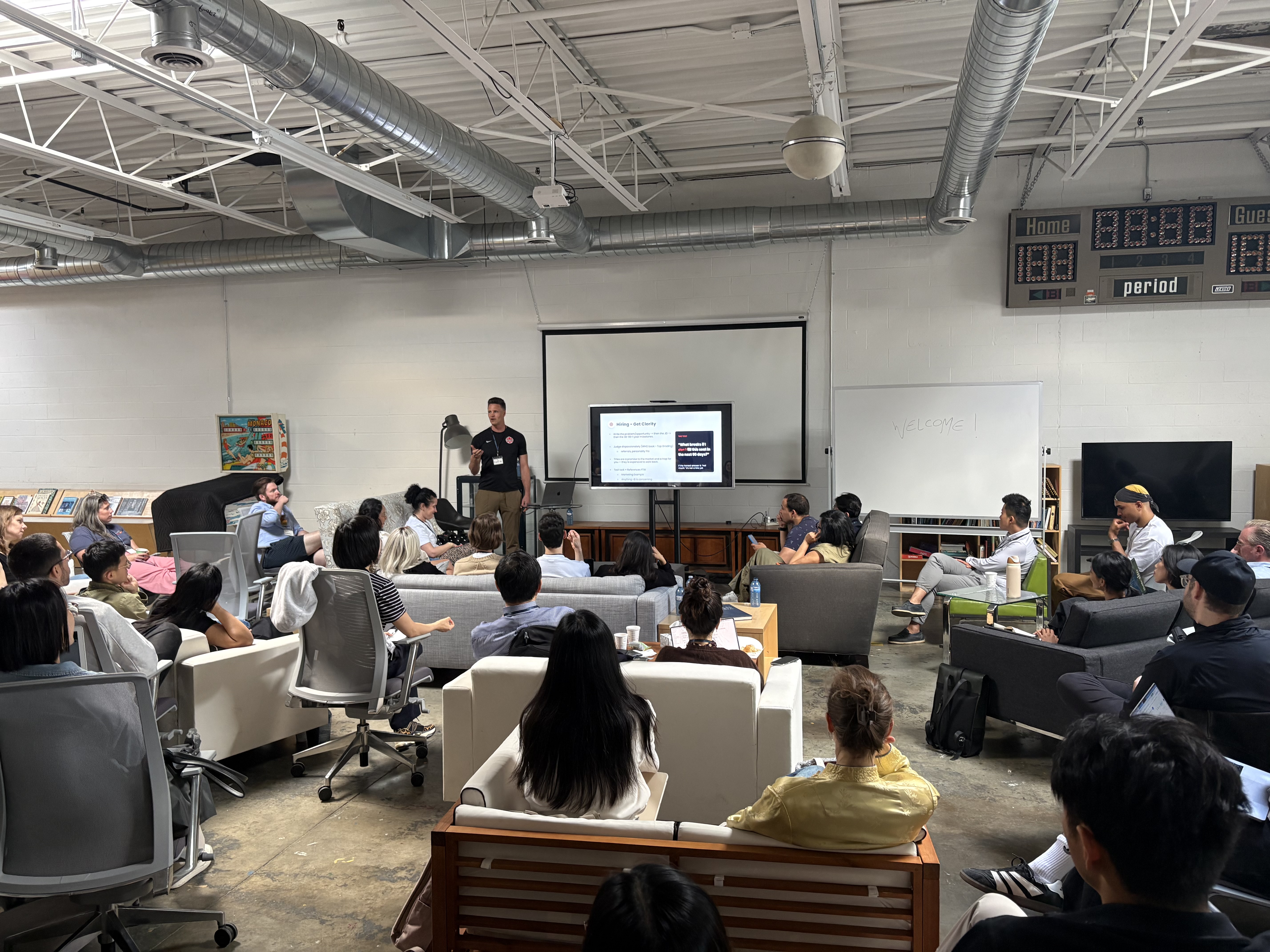 A founder speaking to a room of DTC Toronto attendees