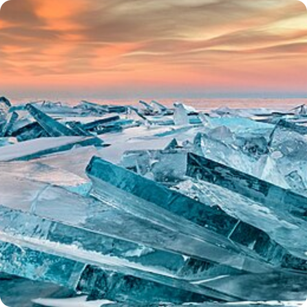 Lake Baikal ice with bright blue frozen surface and cracked crystal patterns