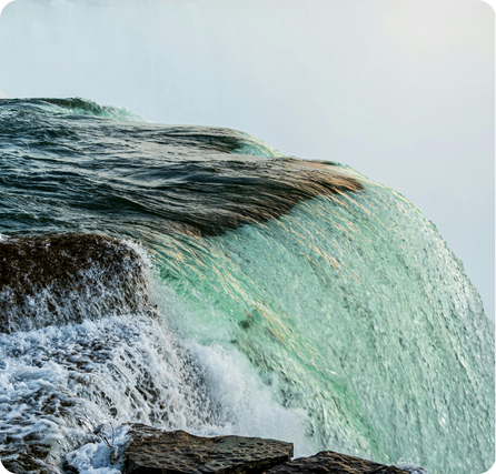 Niagara Falls with massive cascading water flowing over a wide cliff edge