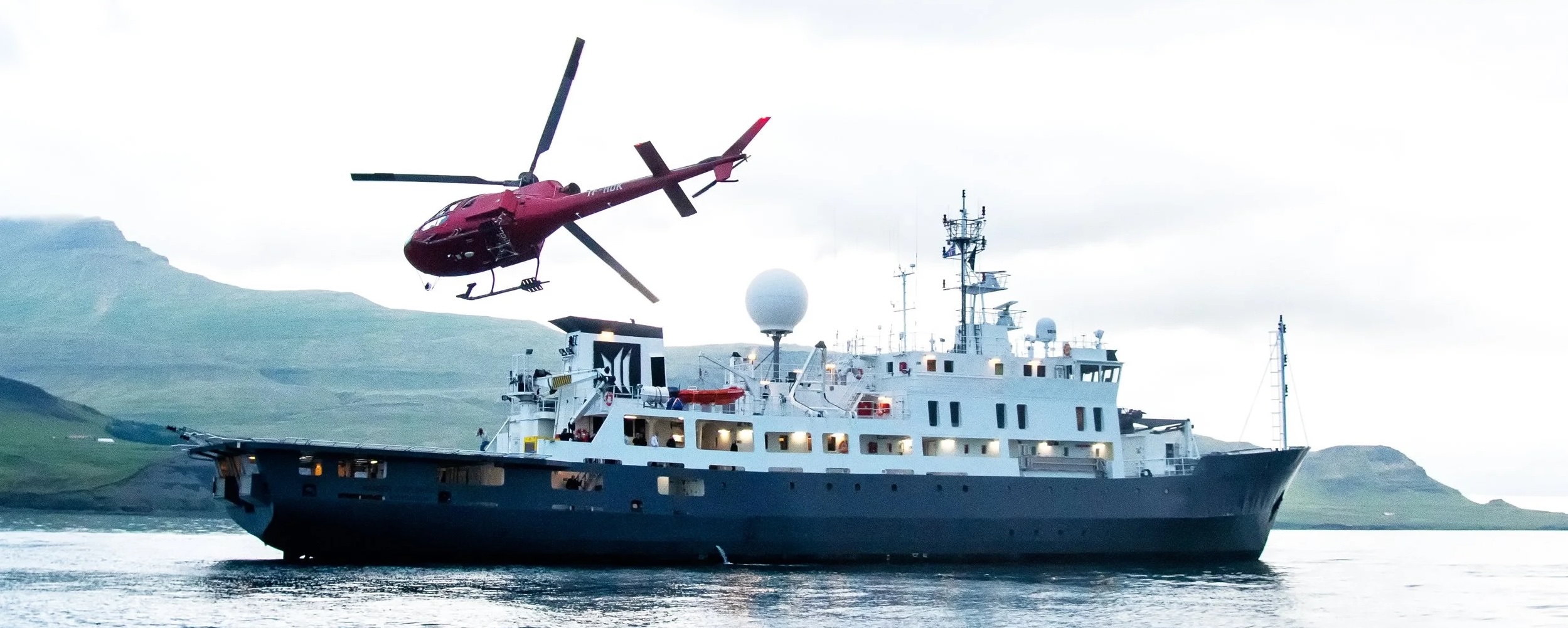 The New Frontier EYOS Nansen Explorer Antarctica super yacht charter heli-skiing