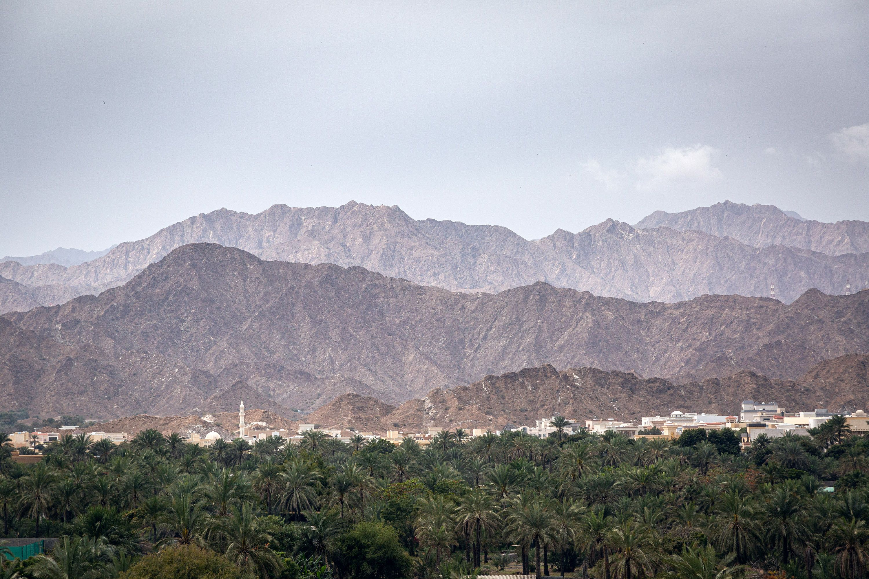 An oasis surrounded by the mountains of Sharjah, United Arab Emirates - UAE
