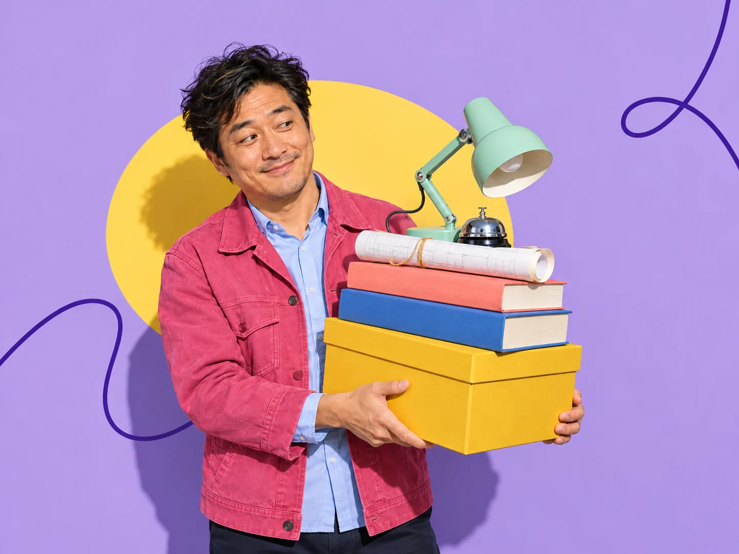 Man in pink jacket holds yellow box topped with books, blueprint, lamp, and bell.