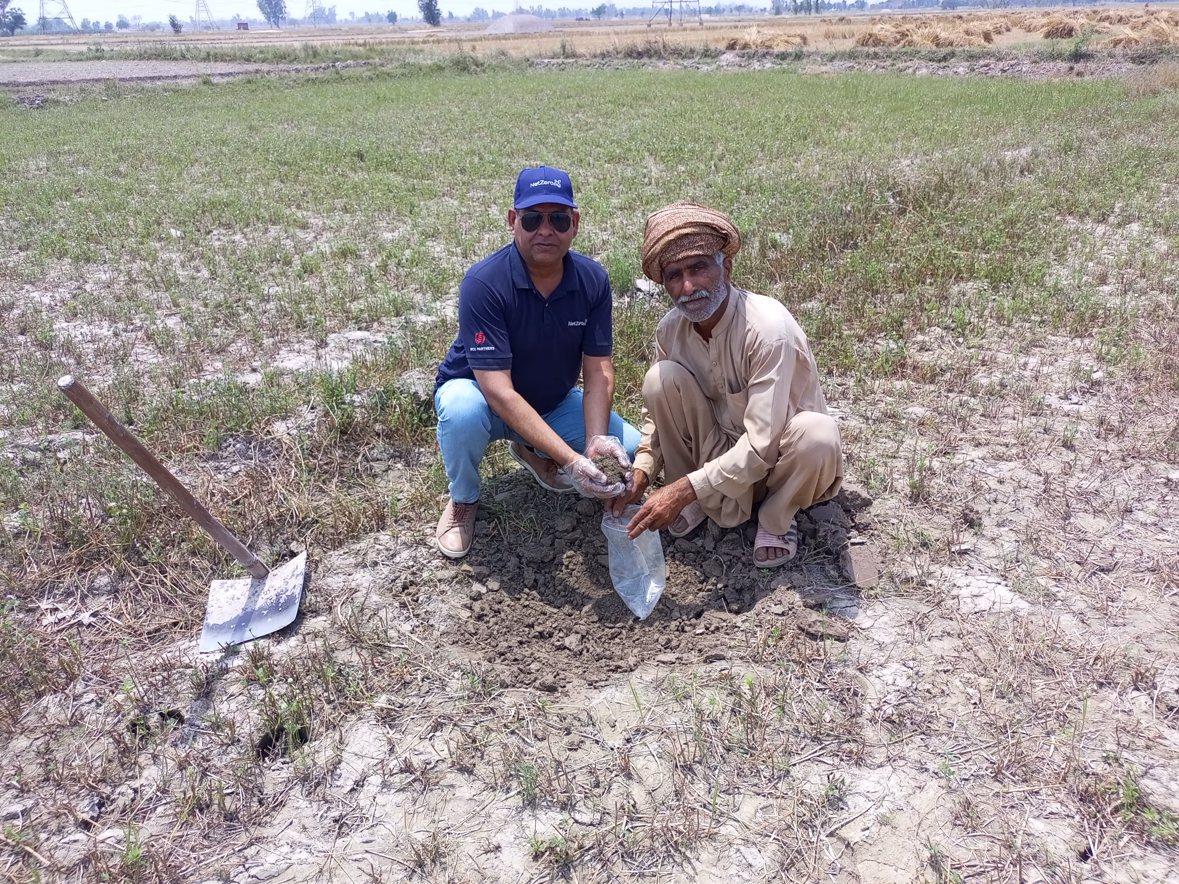 looking at camera with local farmer