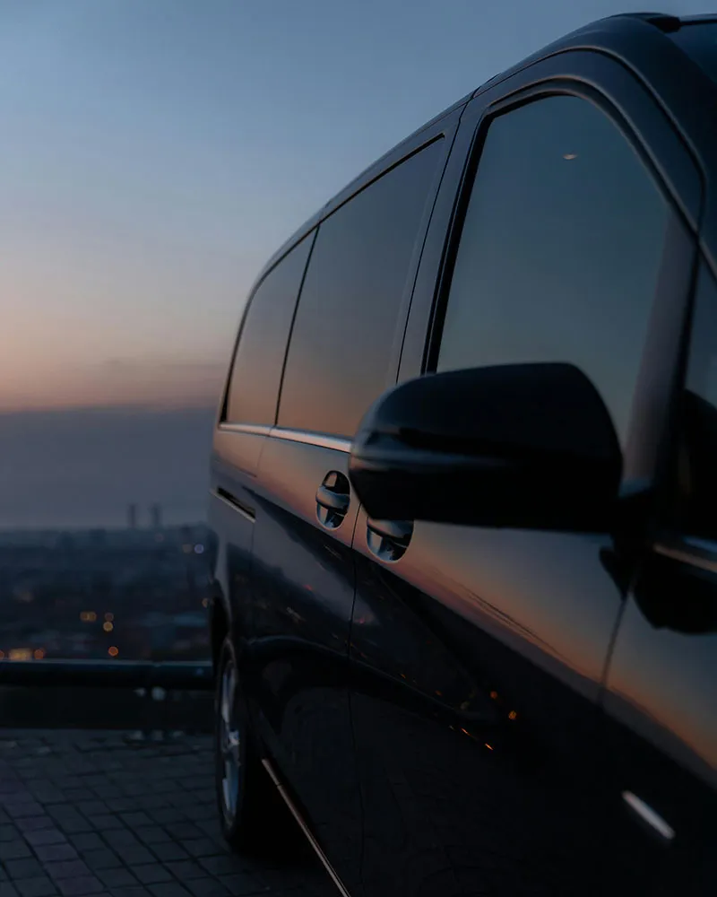 Premium private transfer vehicle at sunset