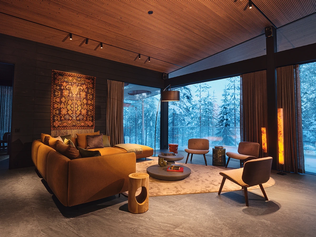 Luxury suite with fireplace and forest views