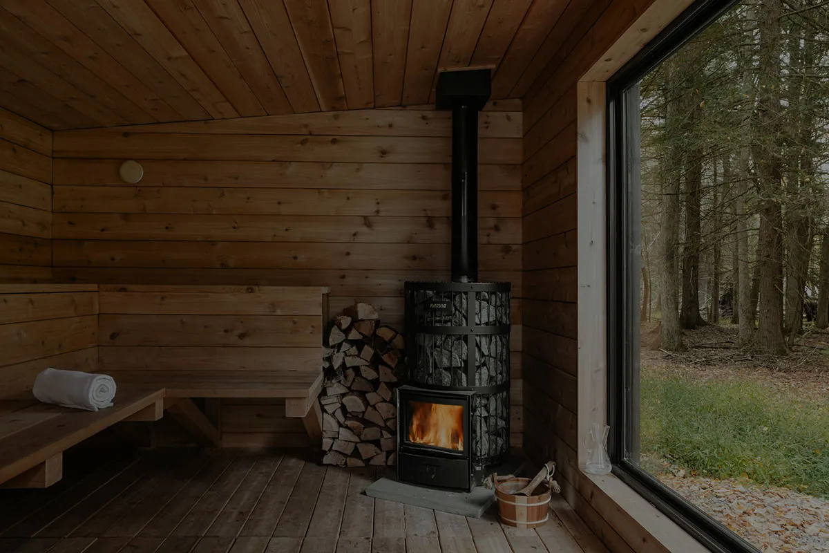 Private sauna overlooking a Nordic forest