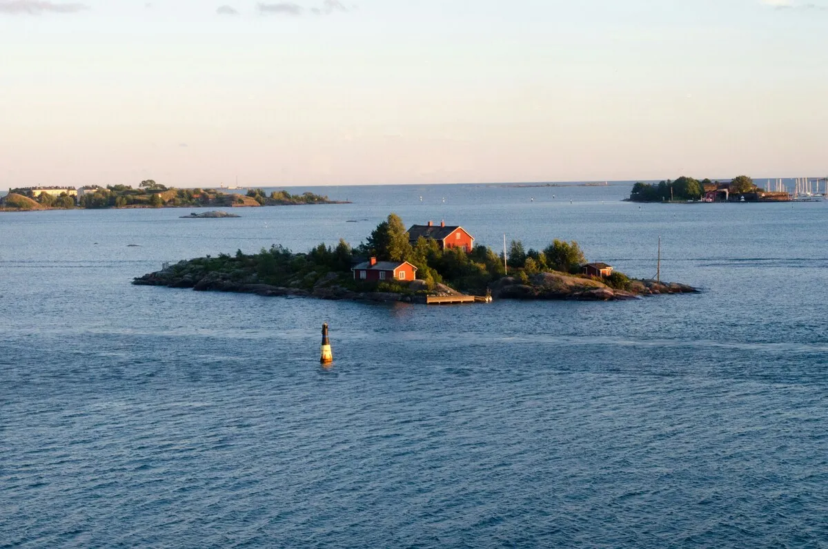 Small island surrounded by calm Baltic Sea waters