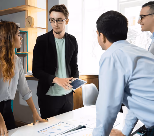 Recruitment team collaborating with professionals during a hiring discussion