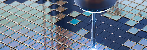 Automated probe testing semiconductor chips on a wafer