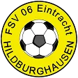 Logo des Fußballvereins FSV 06 Eintracht Hildburghausen mit einem schwarzen und weißen Fußball in der Mitte eines gelben Kreises.