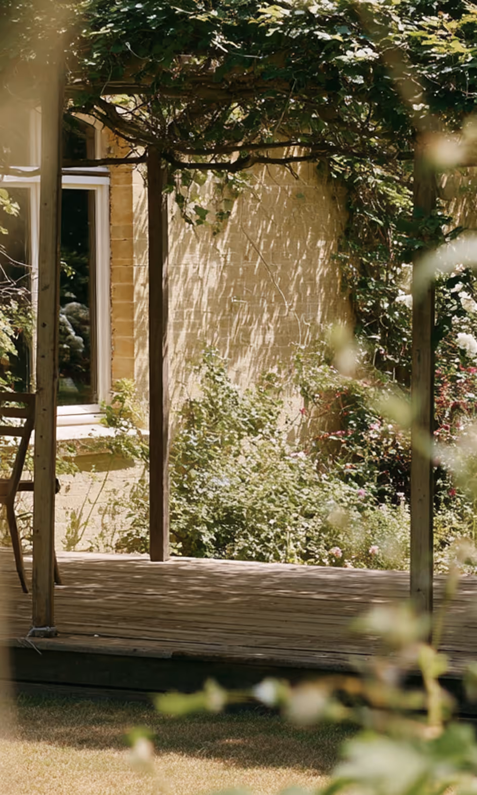 the backyard of a house with a thatched roof