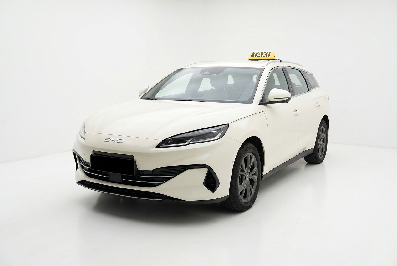 White BYD electric taxi car angled left in a white studio background.