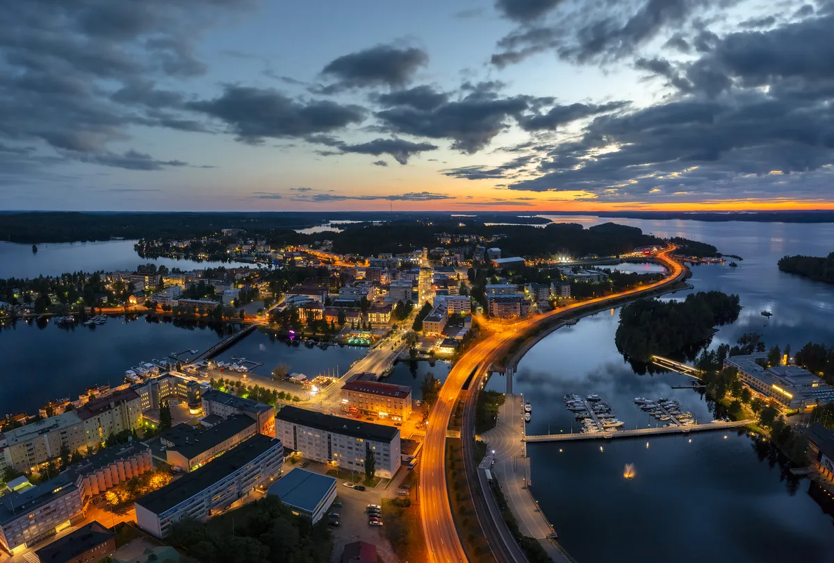 Savonlinna and its lakes lit up at dusk