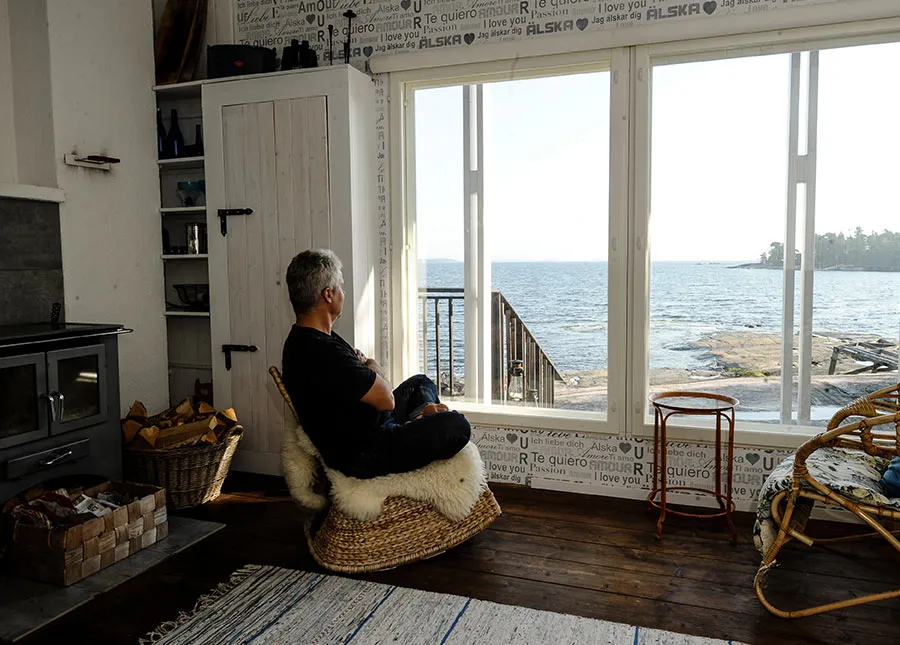 Local summer cottage interior with sea views during a private Helsinki archipelago experience