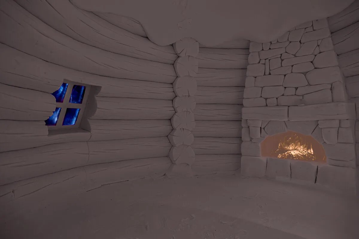 Animal sculptures beneath a blue-lit snow ceiling